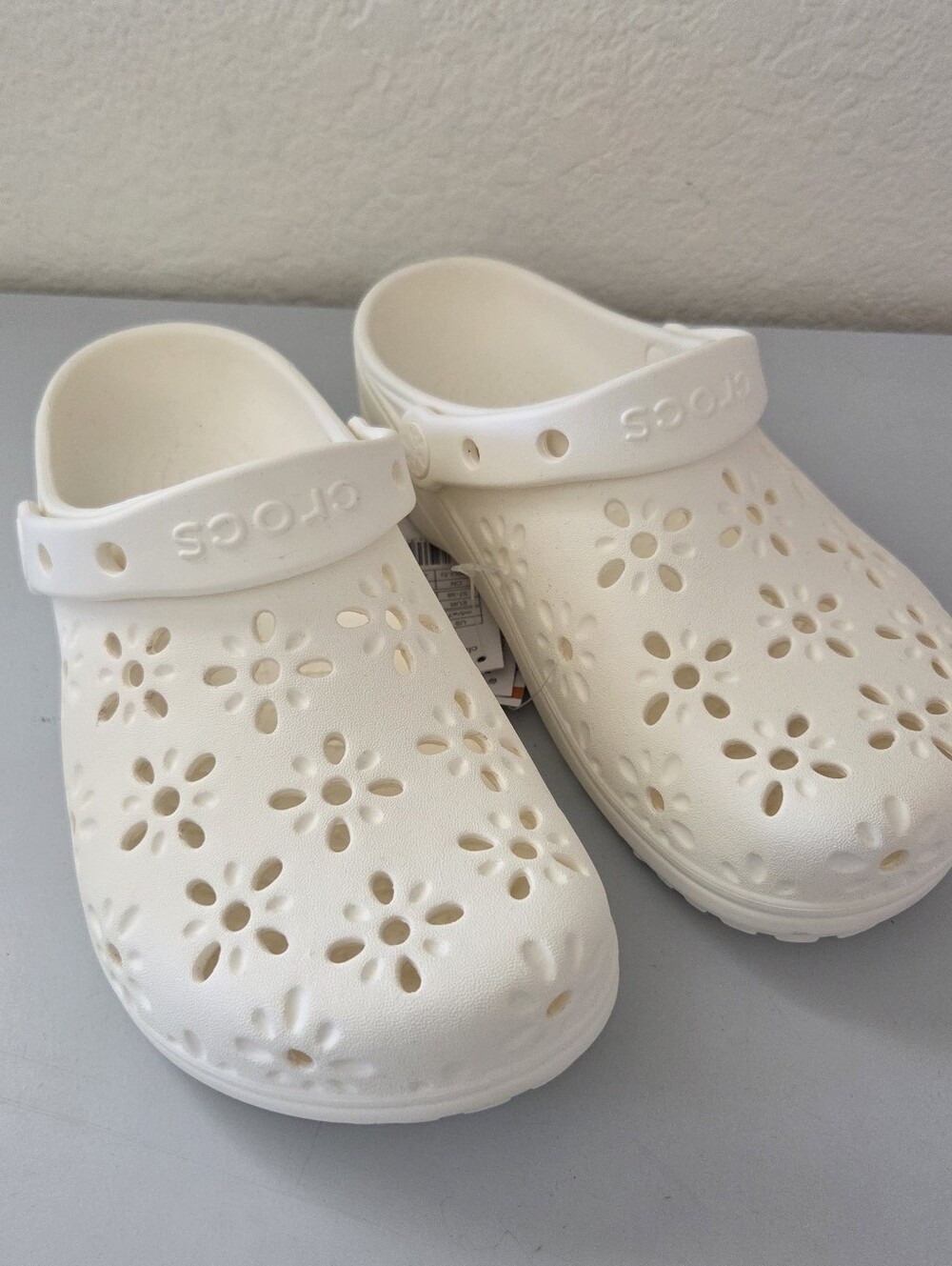 Crocs Classic Floral Cut-Out Clogs in the color Chalk L7 M5